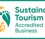 Accredited business logo for sustainable tourism on the Sunshine Coast.